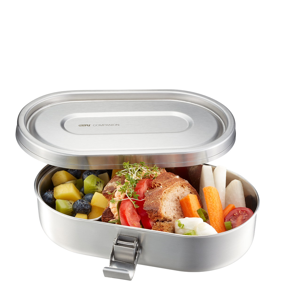 Edelstahl-Brotdose mit frischem Obst und Gemüse Geöffnete Edelstahl-Brotdose mit gesunden Snacks wie Obst und Gemüse, darunter Ananas, Kiwi, Heidelbeeren, Brot, Tomaten, Karottensticks und Radieschen