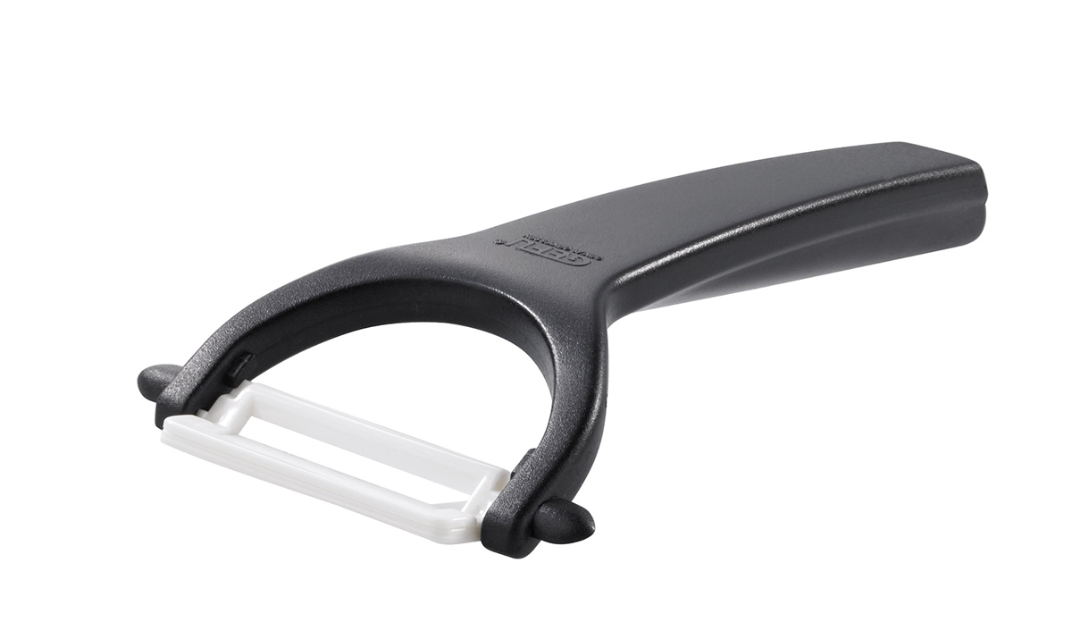 Ergonomischer Sparschäler mit keramischer Klinge Schwarzer Sparschäler mit ergonomischem Griff und weißer keramischer Klinge