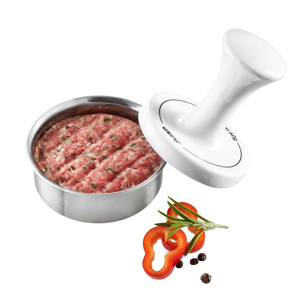 Geflügelburger-Presse mit Deckel und Gewürzen Geflügelburger-Presse mit rohem Hackfleisch, Paprika, Pfefferkörnern und Rosmarin