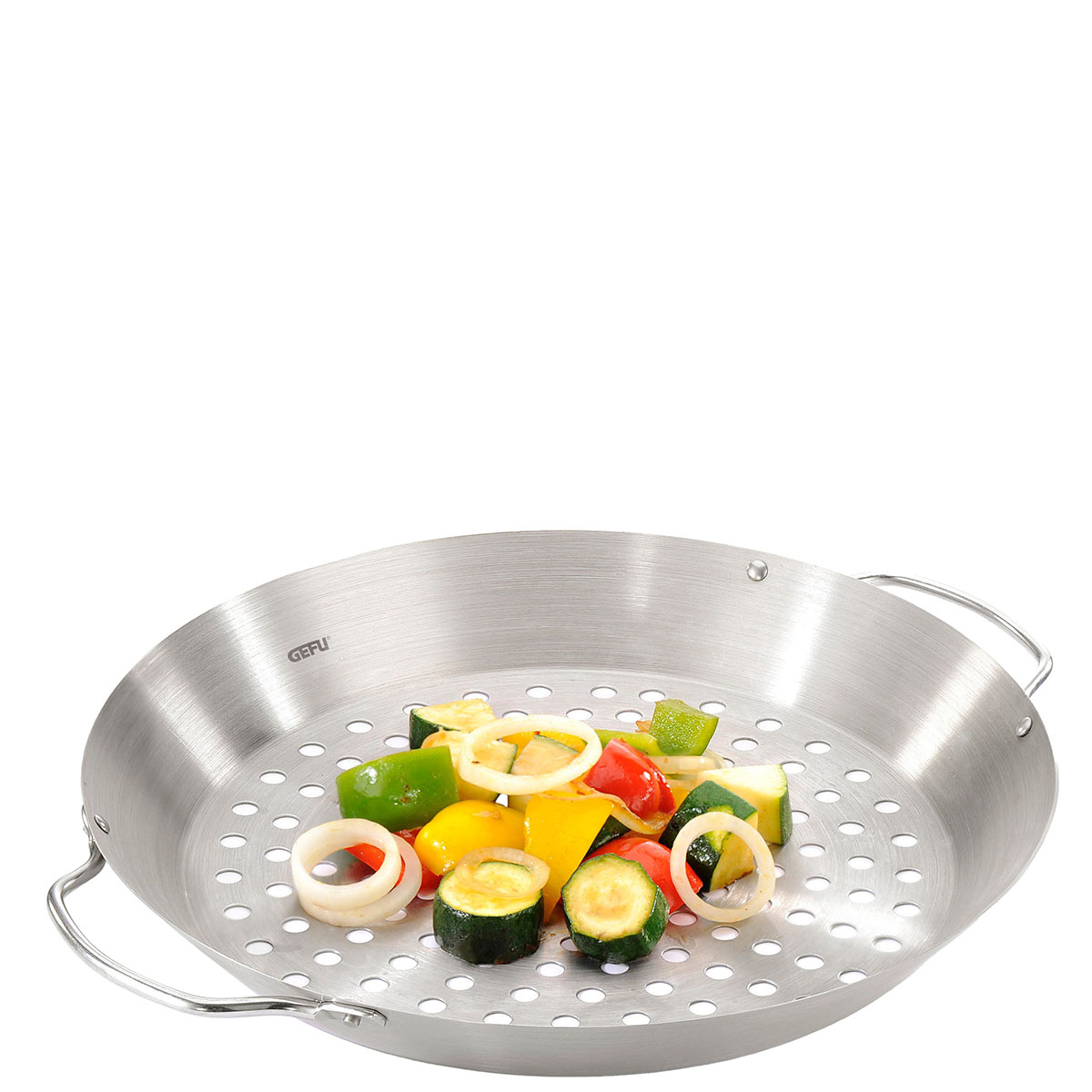 Runde Grillpfanne aus Edelstahl mit Gemüse Runde Grillpfanne aus Edelstahl, gefüllt mit buntem, geschnittenem Gemüse wie Paprika, Zucchini und Zwiebeln