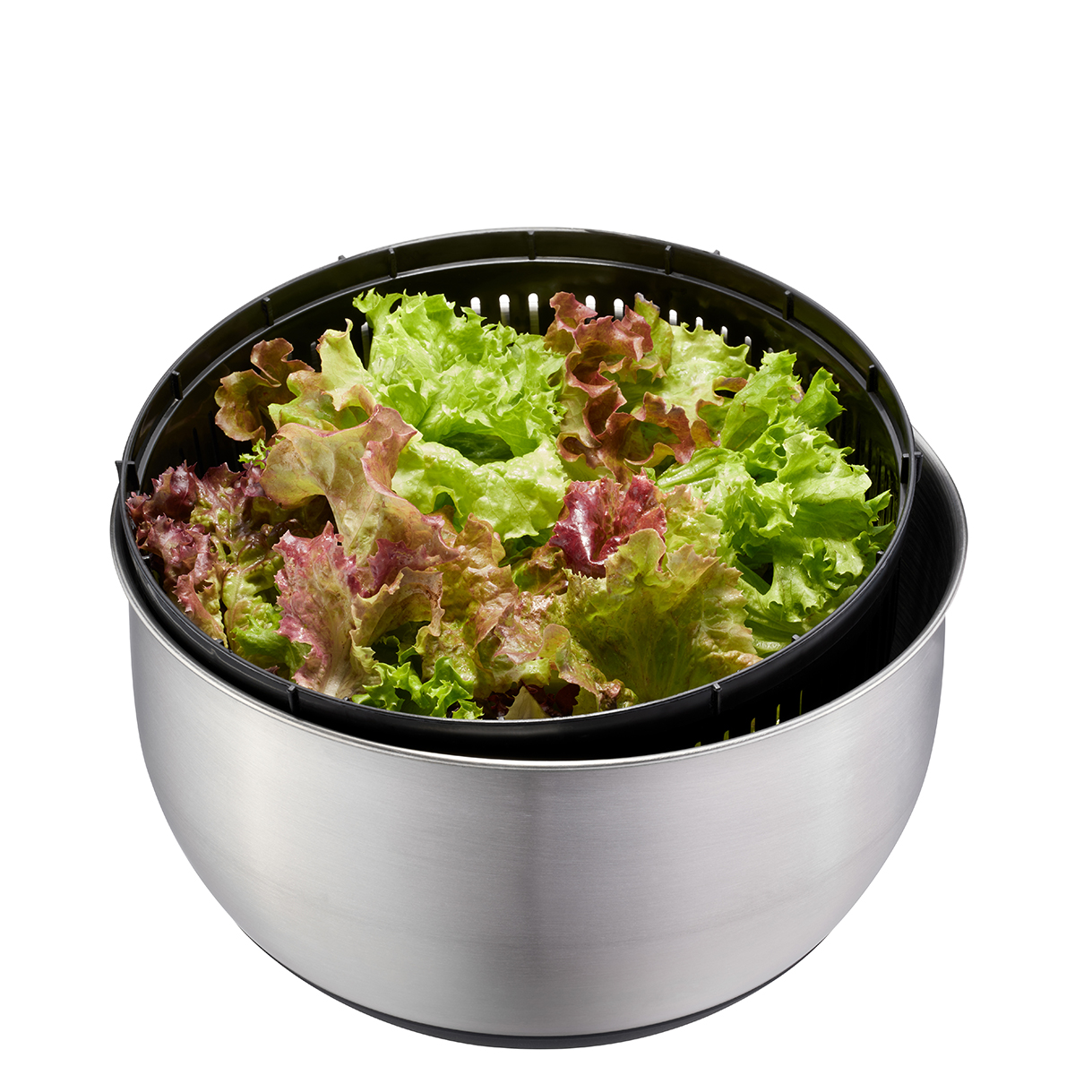 Salatschleuder aus Edelstahl mit frischem Salat Salatschleuder aus Edelstahl gefüllt mit grünem und rotem Blattsalat