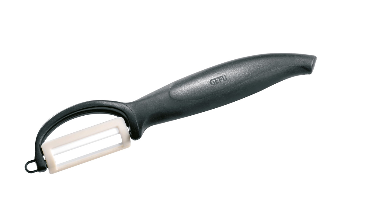 Schwarzer Gemüseschäler mit Keramikklinge und ergonomischem Griff Gemüseschäler mit schwarzem Griff und weißer Keramikklinge
