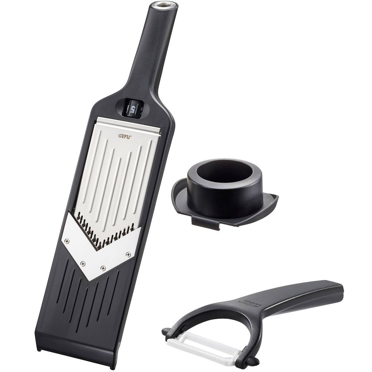 Mandoline Gemüsehobel Set mit verstellbarer Klinge und Sicherheitshalter Ein Mandoline Gemüsehobel Set bestehend aus einem verstellbaren Hobel, einem Sicherheitshalter und einem Schälmesser, ideal zum präzisen Schneiden von Gemüse.
