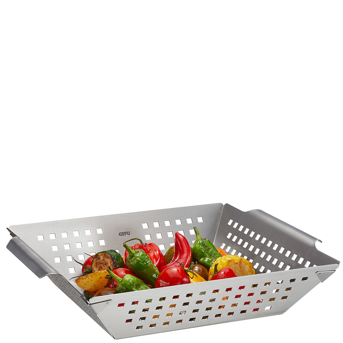 Edelstahl-Grillkorb mit Gemüse Ein Edelstahl-Grillkorb, gefüllt mit frischem Gemüse wie Paprika und Zucchini.