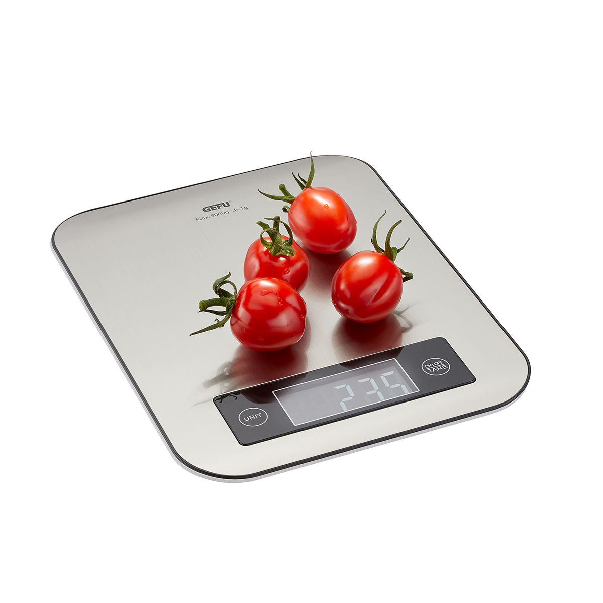 Digitale Küchenwaage mit frischen Tomaten Digitale Küchenwaage zeigt Gewicht von Tomaten an