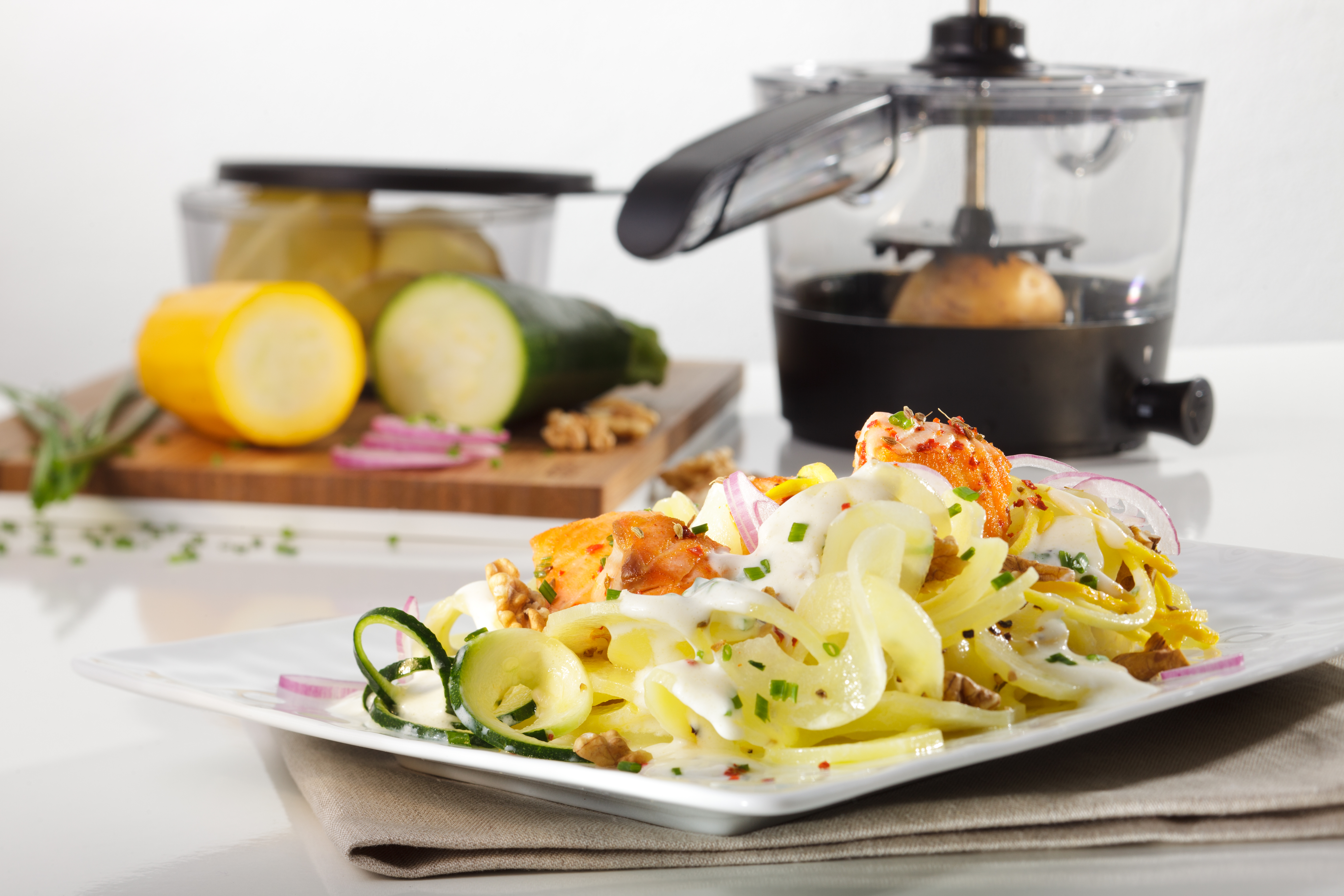 Potato salad with sautéed salmon cubes