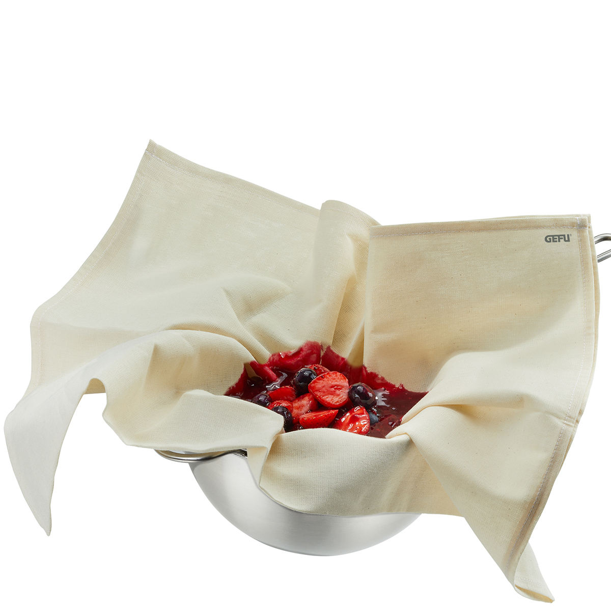 Fruchtpresse mit Baumwolltuch und frischen Beeren Eine Schüssel mit einem Baumwolltuch und darauf liegenden frischen Beeren, bereit zur Saftpressung.