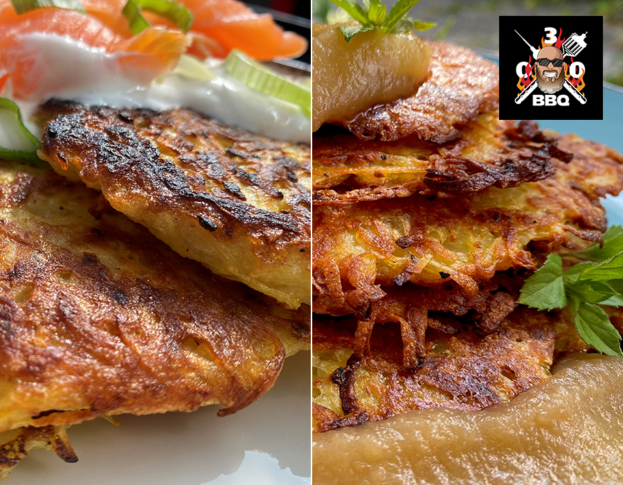 Kartoffelpuffer Nahaufnahme von knusprigen Kartoffelpuffern, serviert mit Lachs, Apfelmus und einem Kräuterdekor.